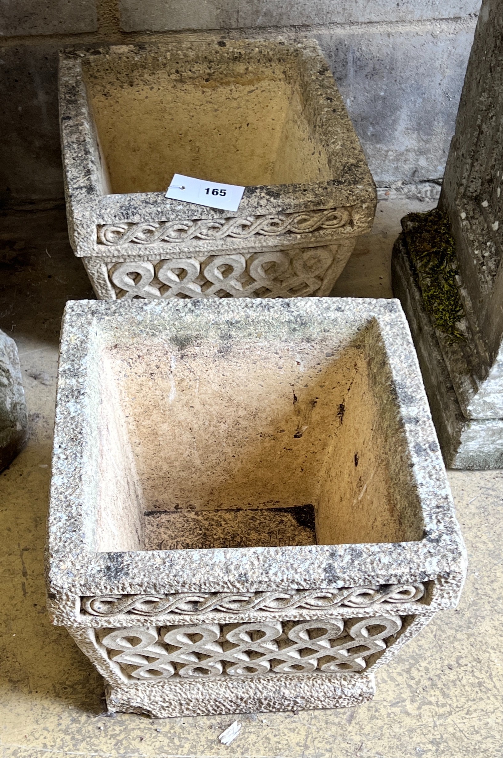 A pair of small reconstituted stone square garden planters, width 30cm, height 25cm